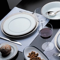Beautiful, white Limoges porcelain with a dynamic platinum border, the geometric motif of the Athena collection creates a dimensional and graphic appearance. Also available with gold border. Beautiful, white Limoges porcelain with a dynamic platinum border, the geometric motif of the Athena collection creates a dimensional and graphic appearance. Also available with gold border.