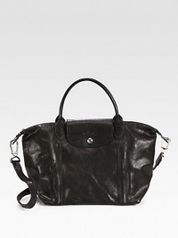A classic iconic style, now in luxurious leather with a versatile strap.Double top handles, 4½ dropDetachable shoulder strap, 17 dropTop zip closure with snap flapOne inside zip pocketOne inside open pocketFully lined9½W X 9½H X 6DImported A classic iconic style, now in luxurious leather with a versatile strap.Double top handles, 4½ dropDetachable shoulder strap, 17 dropTop zip closure with snap flapOne inside zip pocketOne inside open pocketFully lined9½W X 9½H X 6DImported