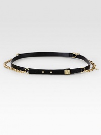 A luxurious snake belt is accented by goldtone chains, studded closure and logo-engraved belt keeper.Width, about .5RattlesnakeImported A luxurious snake belt is accented by goldtone chains, studded closure and logo-engraved belt keeper.Width, about .5RattlesnakeImported