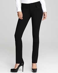 Leather trim lends a luxe edge to these Alice + Olivia slim pants, designed in stretch wool for a sleek silhouette. Leather trim lends a luxe edge to these Alice + Olivia slim pants, designed in stretch wool for a sleek silhouette.