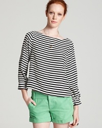Get all decked out in an Alice + Olivia boat neck top in a luxe stretch silk with boldly patterned stripes. Get all decked out in an Alice + Olivia boat neck top in a luxe stretch silk with boldly patterned stripes.