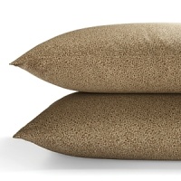 Delicate tree saplings in bronze, gold and umber tones are printed on a twill background on duvets, comforters, and shams in this organic, earthy bedding collection from Calvin Klein Home. A small printed leaf pattern in complementary hues accents sheets and pillowcases. Delicate tree saplings in bronze, gold and umber tones are printed on a twill background on duvets, comforters, and shams in this organic, earthy bedding collection from Calvin Klein Home. A small printed leaf pattern in complementary hues accents sheets and pillowcases.