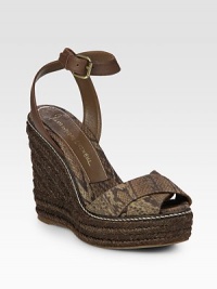 Snake-print canvas upper with a straw espadrille wedge and adjustable leather ankle strap. Straw-covered wedge, 5 (125mm)Straw-covered platform, 1 (25mm)Compares to a 4 heel (100mm)Canvas and leather upperLeather and canvas liningRubber soleImportedOUR FIT MODEL RECOMMENDS ordering one half size up as this style runs small. Snake-print canvas upper with a straw espadrille wedge and adjustable leather ankle strap. Straw-covered wedge, 5 (125mm)Straw-covered platform, 1 (25mm)Compares to a 4 heel (100mm)Canvas and leather upperLeather and canvas liningRubber soleImportedOUR FIT MODEL RECOMMENDS ordering one half size up as this style runs small.
