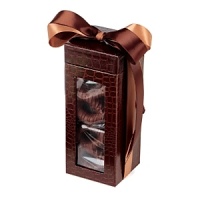 Nicely wrapped in a beautiful box and bow, these chocolate-covered confections are a mouthwatering delight - perfect for gift giving. Nicely wrapped in a beautiful box and bow, these chocolate-covered confections are a mouthwatering delight - perfect for gift giving.