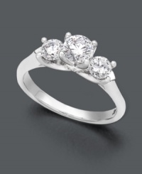 Make her heart melt thrice over. This stunning three stone engagement ring features luminous round-cut diamonds - one sparkling center diamond (1/2 ct. t.w.) and two bordering diamonds (1/4 ct. t.w.). Ring crafted in a polished 18k white gold setting. IGI Certified diamonds. Make her heart melt thrice over. This stunning three stone engagement ring features luminous round-cut diamonds - one sparkling center diamond (1/2 ct. t.w.) and two bordering diamonds (1/4 ct. t.w.). Ring crafted in a polished 18k white gold setting. IGI Certified diamonds.
