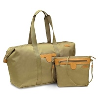 The Hartmann Packcloth Collection offers the ultimate in practical convenience-with classic, sophisticated style. Made of extremely durable, lightweight 400-denier nylon with antique brassware and Hartmann's signature trim, the combo duffel and the crossbody bag get you out of town with ease. The Hartmann Packcloth Collection offers the ultimate in practical convenience-with classic, sophisticated style. Made of extremely durable, lightweight 400-denier nylon with antique brassware and Hartmann's signature trim, the combo duffel and the crossbody bag get you out of town with ease.