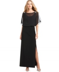 Xscape's evening gown is sheer modern elegance with its split sleeves, blouson-style bodice and beaded embellishments. A slit at the front leg was made to show off a pair of strappy heels. Xscape's evening gown is sheer modern elegance with its split sleeves, blouson-style bodice and beaded embellishments. A slit at the front leg was made to show off a pair of strappy heels.