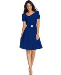 Tahari by ASL's A-line dress makes a beautiful addition to your wardrobe with its polished, belted silhouette and sophisticated details. Tahari by ASL's A-line dress makes a beautiful addition to your wardrobe with its polished, belted silhouette and sophisticated details.