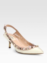 A kitten heel heightens this leather point toe pump, with an adjustable slingback strap and signature metal studs. Metal heel, 2½ (65mm)Leather upper with metal studsPoint toeAdjustable slingback strapLeather lining and solePadded insoleMade in Italy A kitten heel heightens this leather point toe pump, with an adjustable slingback strap and signature metal studs. Metal heel, 2½ (65mm)Leather upper with metal studsPoint toeAdjustable slingback strapLeather lining and solePadded insoleMade in Italy