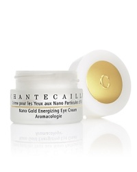 Nano Gold Energizing Eye Cream is an innovative eye cream that uses advanced technology to smooth, firm and rebuild the delicate skin around the eyes. It is a highly technical formula, safely and effectively employing new scientific breakthroughs to nourish the eyes, minimize puffiness and reduce dark circles and inflammation. A highly efficient eye cream, it relies on nano-technology, a groundbreaking scientific advance to safely deliver energizing, detoxifying 24 karat gold to a cellular level. Anti-inflammatory, anti-bacterial and anti-aging gold is bound to silk, a highly moisturizing protein, which penetrates the skin to stimulate cell regeneration and collagen production. Also contains Swiss apple stem cells from the super antioxidant Uttwiler Spätlauber to considerably slow the skin's aging process. Contains 77% botanicals, including a healing base of Pure Rosewater. Nano Gold Energizing Eye Cream is an innovative eye cream that uses advanced technology to smooth, firm and rebuild the delicate skin around the eyes. It is a highly technical formula, safely and effectively employing new scientific breakthroughs to nourish the eyes, minimize puffiness and reduce dark circles and inflammation. A highly efficient eye cream, it relies on nano-technology, a groundbreaking scientific advance to safely deliver energizing, detoxifying 24 karat gold to a cellular level. Anti-inflammatory, anti-bacterial and anti-aging gold is bound to silk, a highly moisturizing protein, which penetrates the skin to stimulate cell regeneration and collagen production. Also contains Swiss apple stem cells from the super antioxidant Uttwiler Spätlauber to considerably slow the skin's aging process. Contains 77% botanicals, including a healing base of Pure Rosewater.