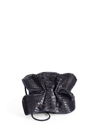 THE LOOKCrossbody strapCinched flapMagnetic tab closure under flapDrawstring topInside logo detailTHE MEASUREMENTCrossbody strap, 32 drop5W X 4H X 2½DTHE MATERIALPythonLeather and printed fabric liningORIGINMade in USA THE LOOKCrossbody strapCinched flapMagnetic tab closure under flapDrawstring topInside logo detailTHE MEASUREMENTCrossbody strap, 32 drop5W X 4H X 2½DTHE MATERIALPythonLeather and printed fabric liningORIGINMade in USA