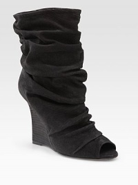 Suede peep toe design with a stylishly slouched front and an uplifting wedge. Stacked wedge, 4 (100mm) Shaft, 7½ Leg circumference, 12½ Suede upper Leather lining and sole Padded insole Made in ItalyOUR FIT MODEL RECOMMENDS ordering one half size up as this style runs small. Suede peep toe design with a stylishly slouched front and an uplifting wedge. Stacked wedge, 4 (100mm) Shaft, 7½ Leg circumference, 12½ Suede upper Leather lining and sole Padded insole Made in ItalyOUR FIT MODEL RECOMMENDS ordering one half size up as this style runs small.