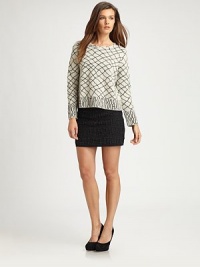 Elaborate beading adds a textured touch to this sharply cut mini skirt. Ribbed crewneckSide zipperFully linedAbout 14 longBeaded cottonDry cleanImportedModel shown is 5'9 (176cm) wearing US size Small. Elaborate beading adds a textured touch to this sharply cut mini skirt. Ribbed crewneckSide zipperFully linedAbout 14 longBeaded cottonDry cleanImportedModel shown is 5'9 (176cm) wearing US size Small.