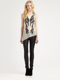 Contrasting appliqué and an asymmetrical hem give this lightweight tank a sophisticated makeover. Structured v-neckSleevelessAsymmetrical hemExposed back zipperPolyesterDry cleanMade in USA of Italian fabricModel shown is 5'10 (177cm) wearing US size Small. Contrasting appliqué and an asymmetrical hem give this lightweight tank a sophisticated makeover. Structured v-neckSleevelessAsymmetrical hemExposed back zipperPolyesterDry cleanMade in USA of Italian fabricModel shown is 5'10 (177cm) wearing US size Small.
