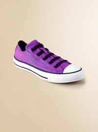A timeless silhouette is freshened with allover glittery sparkles. Slip-on styleStretch cotton upperRubber soleTraditional Chuck insoleImported A timeless silhouette is freshened with allover glittery sparkles. Slip-on styleStretch cotton upperRubber soleTraditional Chuck insoleImported