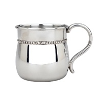 Designed with a beaded border, this baby cup offers classic good looks in non-tarnish bright pewter with a bulged body and softly curved handle. What a wonderful way to honor the new arrival in your life. Designed with a beaded border, this baby cup offers classic good looks in non-tarnish bright pewter with a bulged body and softly curved handle. What a wonderful way to honor the new arrival in your life.