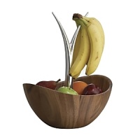 Create a deliciously playful look with this lively fruit bowl from Nambé. Fill the bowl with seasonal produce, and drape bananas or grapes over the metal fingers. The rich, natural wood tones make the colors pop. Create a deliciously playful look with this lively fruit bowl from Nambé. Fill the bowl with seasonal produce, and drape bananas or grapes over the metal fingers. The rich, natural wood tones make the colors pop.