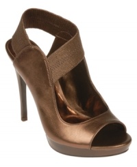 The Carlos by Carlos Santana Halo sandals are heaven sent with their snappy elastic strap, glowing metallic finish and perfect platform silhouette. The Carlos by Carlos Santana Halo sandals are heaven sent with their snappy elastic strap, glowing metallic finish and perfect platform silhouette.