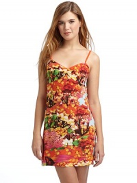 THE LOOKAllover floral printCinched detail at bustAdjustable spaghetti strapsOpen back with strap detailTHE FITAbout 33 from shoulder to hemTHE MATERIALPolyester/spandexCARE & ORIGINMachine washImportedModel shown is 5'10 (177cm) wearing US size Small. THE LOOKAllover floral printCinched detail at bustAdjustable spaghetti strapsOpen back with strap detailTHE FITAbout 33 from shoulder to hemTHE MATERIALPolyester/spandexCARE & ORIGINMachine washImportedModel shown is 5'10 (177cm) wearing US size Small.