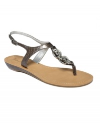 Glam it up. Metal embellishments add just the right finishing touches to the cool Glitz Flat thongs by Marc Fisher. Glam it up. Metal embellishments add just the right finishing touches to the cool Glitz Flat thongs by Marc Fisher.