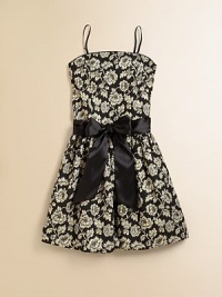 She'll be simply stunning in this gorgeous jacquard frock with a princess-like full skirt and fancy sash tie.Straight necklineAdjustable spaghetti strapsConcealed back zipperWaistband with sash tieFully linedPolyesterDry cleanMade in USA of imported fabric She'll be simply stunning in this gorgeous jacquard frock with a princess-like full skirt and fancy sash tie.Straight necklineAdjustable spaghetti strapsConcealed back zipperWaistband with sash tieFully linedPolyesterDry cleanMade in USA of imported fabric