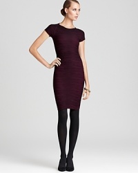 Richly-colored tonal stripes lend texture and definition to this sophisticated BCBGeneration dress while a sheer latticework design on back adds an alluring element of surprise. Richly-colored tonal stripes lend texture and definition to this sophisticated BCBGeneration dress while a sheer latticework design on back adds an alluring element of surprise.