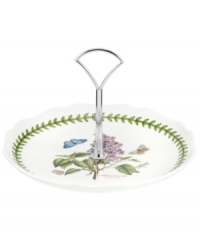 Lifelike lilacs and Portmeirion's triple-leaf border grace this daintily scalloped server, a must-have for the Botanic Garden dinnerware collector. With silvertone metal handle. Lifelike lilacs and Portmeirion's triple-leaf border grace this daintily scalloped server, a must-have for the Botanic Garden dinnerware collector. With silvertone metal handle.