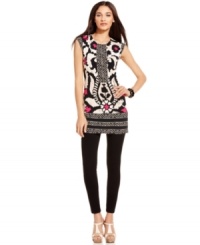 A sleek printed tunic from Alfani adds an element of contemporary chic to any wardrobe. Solid leggings and strappy sandals balance its bold pattern perfectly. A sleek printed tunic from Alfani adds an element of contemporary chic to any wardrobe. Solid leggings and strappy sandals balance its bold pattern perfectly.