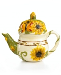 You can't help but cheer up with a cup of hot tea from the sweet Sunflower teapot, featuring hardy stoneware alive with happy yellow blooms and butterflies. A fun gift for fellow tea drinkers. From Pfaltzgraff. You can't help but cheer up with a cup of hot tea from the sweet Sunflower teapot, featuring hardy stoneware alive with happy yellow blooms and butterflies. A fun gift for fellow tea drinkers. From Pfaltzgraff.
