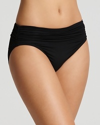Subtle and designed to flatter a range of figures, Carmen Marc Valvo has taken care to construct the perfect little black bikini bottom. Subtle and designed to flatter a range of figures, Carmen Marc Valvo has taken care to construct the perfect little black bikini bottom.