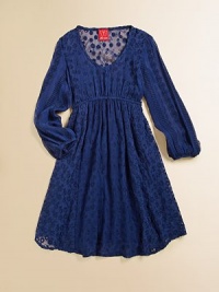 A romantically tailored dress finished with sheer chiffon with floral and eyelet details.V-neckLong peasant sleevesPull-on styleElasticized waistLining: 50% cotton/50% modalOverlay: polyester chiffonMachine washImported A romantically tailored dress finished with sheer chiffon with floral and eyelet details.V-neckLong peasant sleevesPull-on styleElasticized waistLining: 50% cotton/50% modalOverlay: polyester chiffonMachine washImported