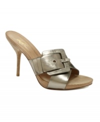 Buckle down. The Elaine mules by Donald J Pliner bring a sexy and sophisticated vibe to your look with a chic, oversized buckle detail and stacked heel. Buckle down. The Elaine mules by Donald J Pliner bring a sexy and sophisticated vibe to your look with a chic, oversized buckle detail and stacked heel.