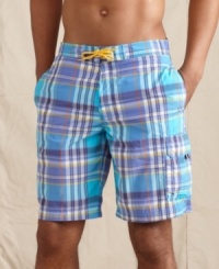 Plaid perfection. Ride a wave of preppy style at the beach this summer with these swim trunks from Tommy Hilfiger. Plaid perfection. Ride a wave of preppy style at the beach this summer with these swim trunks from Tommy Hilfiger.