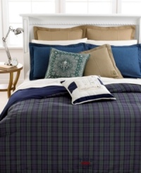 Sporty style meets casual comfort in Lauren Ralph Lauren's Blackwatch down-alternative comforter. A deep-hued plaid in pure cotton reverses to solid midnight blue to bring a stylish appeal to lounge-time. Finished with the Polo Ralph Lauren logo at the base and stitched edges on all four sides. Sporty style meets casual comfort in Lauren Ralph Lauren's Blackwatch down-alternative comforter. A deep-hued plaid in pure cotton reverses to solid midnight blue to bring a stylish appeal to lounge-time. Finished with the Polo Ralph Lauren logo at the base and stitched edges on all four sides.
