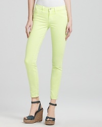 Tap into the season's neon trend with these pop-bright J Brand skinny jeans. Tap into the season's neon trend with these pop-bright J Brand skinny jeans.