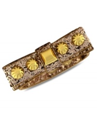 Put a bow on it. This Jessica Simpson bracelet features a gold tone studded bow with glitter detail. Crafted in gold tone mixed metal. Approximate length: 8 inches. Put a bow on it. This Jessica Simpson bracelet features a gold tone studded bow with glitter detail. Crafted in gold tone mixed metal. Approximate length: 8 inches.