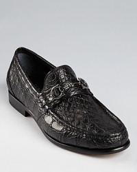 Rendered in authentic crocodile skin for dramatic elegance, these loafers bring the height of luxury to your feet. Rendered in authentic crocodile skin for dramatic elegance, these loafers bring the height of luxury to your feet.