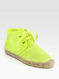 Mesh staple in an eye-catching neon hue with textured rope edges. Mesh upper with faux leather trimRubber solePadded insoleMade in Spain Mesh staple in an eye-catching neon hue with textured rope edges. Mesh upper with faux leather trimRubber solePadded insoleMade in Spain