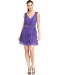 Right on trend, Nine West's dress is perfectly pleated and finished with a skinny belt for a flawless look. Right on trend, Nine West's dress is perfectly pleated and finished with a skinny belt for a flawless look.