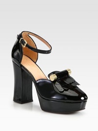 EXCLUSIVELY AT SAKS.COM. Logo-detailed hardware decorates the traditional fringe kiltie of this patent leather pump with an adjustable ankle strap. Self-covered heel, 4¼ (110mm)Covered platform, 1½ (40mm)Compares to a 2¾ heel (70mm)Patent leather upper with logo-detailed adornmentAdjustable ankle strapLeather lining and solePadded insoleMade in France EXCLUSIVELY AT SAKS.COM. Logo-detailed hardware decorates the traditional fringe kiltie of this patent leather pump with an adjustable ankle strap. Self-covered heel, 4¼ (110mm)Covered platform, 1½ (40mm)Compares to a 2¾ heel (70mm)Patent leather upper with logo-detailed adornmentAdjustable ankle strapLeather lining and solePadded insoleMade in France