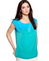 Colorblocked details and a chunky zipper at the back lend modern attitude to this blouse by Kut from the Kloth. Colorblocked details and a chunky zipper at the back lend modern attitude to this blouse by Kut from the Kloth.