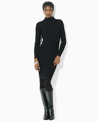 Rendered with a classic mockneck, a chic ribbed dress is crafted in soft merino wool for endless styling options. Rendered with a classic mockneck, a chic ribbed dress is crafted in soft merino wool for endless styling options.