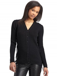 This classic button-front style with a surprisingly luxe goat hair embellished back, leaves a lasting impression every time.V-neck Ribbed long sleeves Front button closure Sheer silk back with tiers of goat hair About 24¼ from shoulder to hem Dyed goat hair Virgin wool Second fabric: silk Dry clean by fur specialist Made in Italy Fur origin: China This classic button-front style with a surprisingly luxe goat hair embellished back, leaves a lasting impression every time.V-neck Ribbed long sleeves Front button closure Sheer silk back with tiers of goat hair About 24¼ from shoulder to hem Dyed goat hair Virgin wool Second fabric: silk Dry clean by fur specialist Made in Italy Fur origin: China