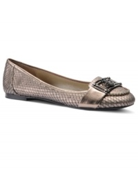 Croc leather gives the Brenna flats by Isola an intriguing look. Contrasting metallic trim along the edges and matching hardware at the toe adds even more flair. Croc leather gives the Brenna flats by Isola an intriguing look. Contrasting metallic trim along the edges and matching hardware at the toe adds even more flair.