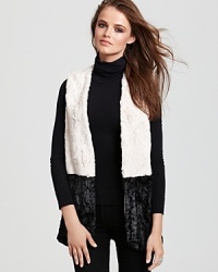 Explore fall's fur trend with this Aqua vest flaunting color blocking for a trend-right look you can wear anytime you want, everywhere you go. Explore fall's fur trend with this Aqua vest flaunting color blocking for a trend-right look you can wear anytime you want, everywhere you go.