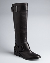 Sparkle with every step in this basic-gone-wild style from B Brian Atwood: buckled-up tall boots feature appealing crystal heels. Sparkle with every step in this basic-gone-wild style from B Brian Atwood: buckled-up tall boots feature appealing crystal heels.