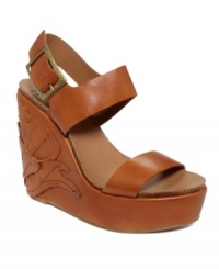 Flower child. Lucky Brand takes a retro wedge silhouette and layers it with lovely flowers to create the cute Stillwater sandals. Flower child. Lucky Brand takes a retro wedge silhouette and layers it with lovely flowers to create the cute Stillwater sandals.