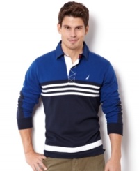 Stripes go sporty on this sharp color-blocked polo shirt from Nautica. Stripes go sporty on this sharp color-blocked polo shirt from Nautica.