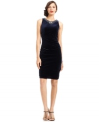Eliza J's dress features a brilliant jeweled neckline and a gorgeous velvet fabrication that's gathered at the hip to flatter. Eliza J's dress features a brilliant jeweled neckline and a gorgeous velvet fabrication that's gathered at the hip to flatter.