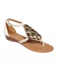 Center of glimmer. The barely-there straps on the Irell sandals by Vince Camuto provide the perfect balance for its stunning jeweled centerpiece. Center of glimmer. The barely-there straps on the Irell sandals by Vince Camuto provide the perfect balance for its stunning jeweled centerpiece.